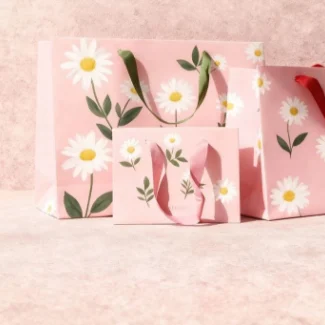 Custom High-End Recyclable Ivory Board Luxury Shopping Clothing Gift Bags With Golden Embossed Logos Cotton Ribbon Accessories