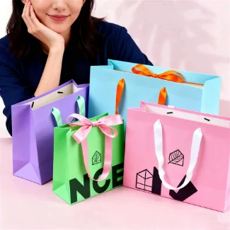 Eco-Friendly Recycled Materials Your Own Logo Shoe Boutique Packaging Ribbon Handle Gift Paper Shopping Bag For Clothes Gifts